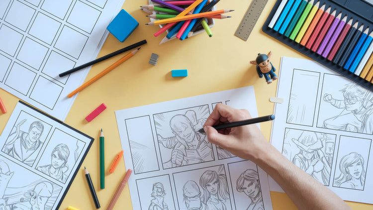 Overhead view of blank comic book pages with panel layouts, sketching in progress, and drawing supplies including markers and pencils. A creative workspace that showcases the comic creation process.