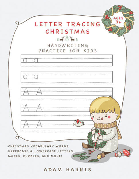 Young boy playing with wreath against kids handwriting practice paper background